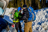 Jenn helping Uncle Bruce get his pack settled.