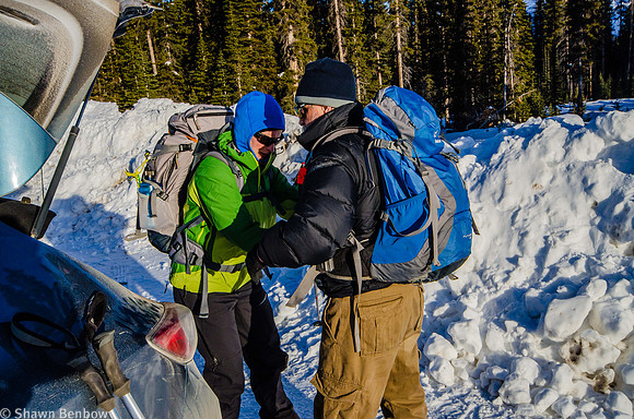 Jenn helping Uncle Bruce get his pack settled.