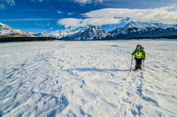 Jenn snowshoeing on the Spray Lakes Reservoir.
