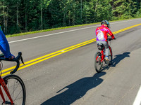 James biking past Jenn.