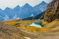Second Minnestimma Lake in the Larch Valley, Eiffel Ridge is immediately behind, and the Wenkchemna Peaks form a wall in the distance