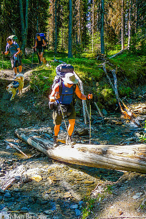 Shawn crossing a small tributary to Tumbling Creek.