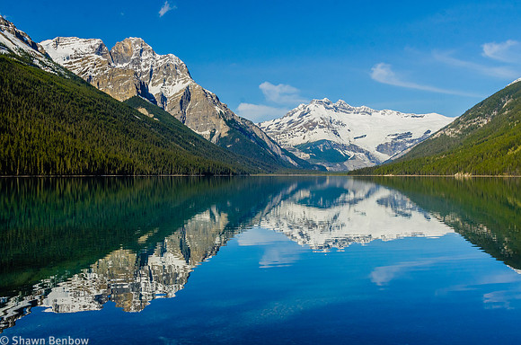 Mount Forbes and Divisoin Mountain reflected in Glacier Lake.