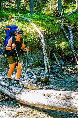Christina crossing the tributary to Tumbling Creek.