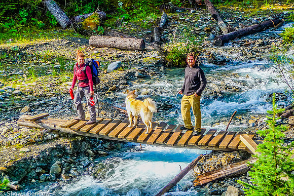 Christina, Charlie, and Adam crossing Numa Creek at the campground.