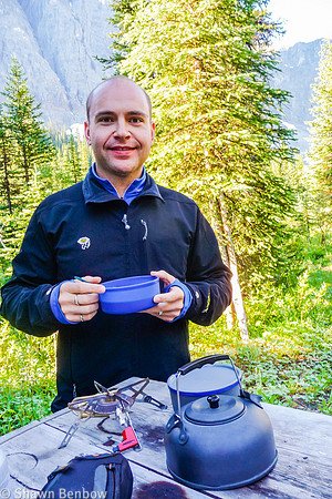 Shawn eating his oatmeal and cofee at Helmet Falls Campground.