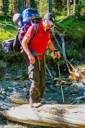 Mark crossing the tributary of Tumbling Creek.