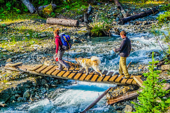 Christina, Charlie, and Adam crossing Numa Creek at the campground.