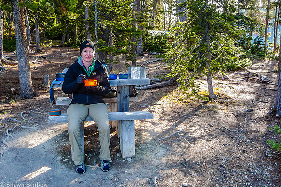 Jenn eating breakfast at the Glacier Lake Campground.